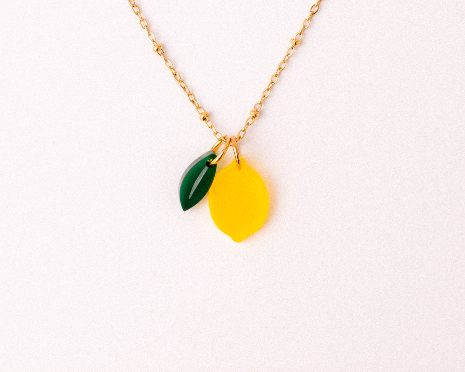 acutecolor Kette mit Zitrone und Blatt Anhänger