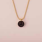 acutecolor Einzelner schwarzer Smiley Anhänger