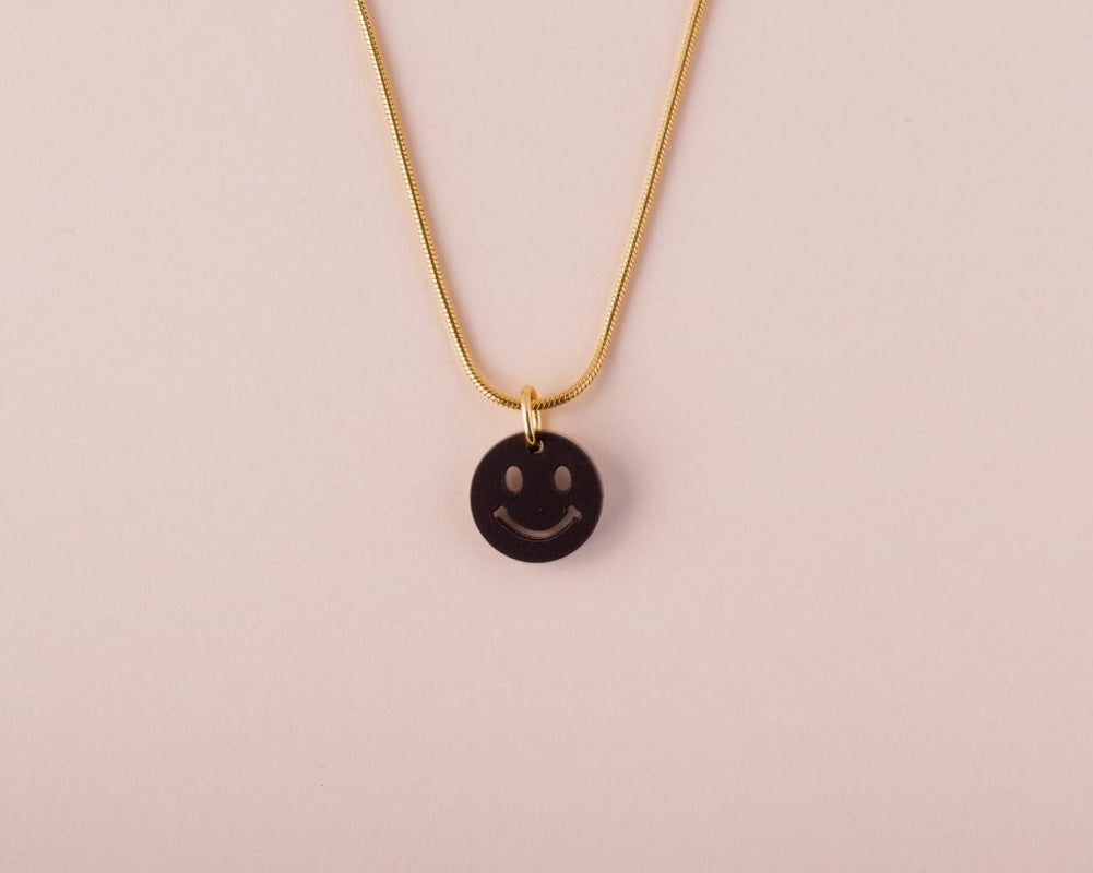acutecolor Einzelner schwarzer Smiley Anhänger